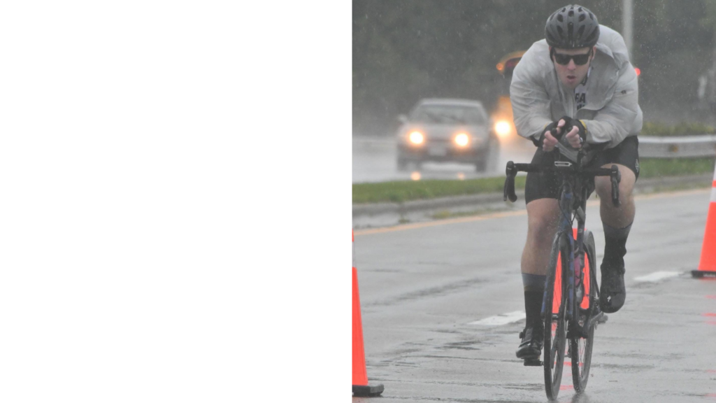 Luke Ferzacca rides a bike on a street